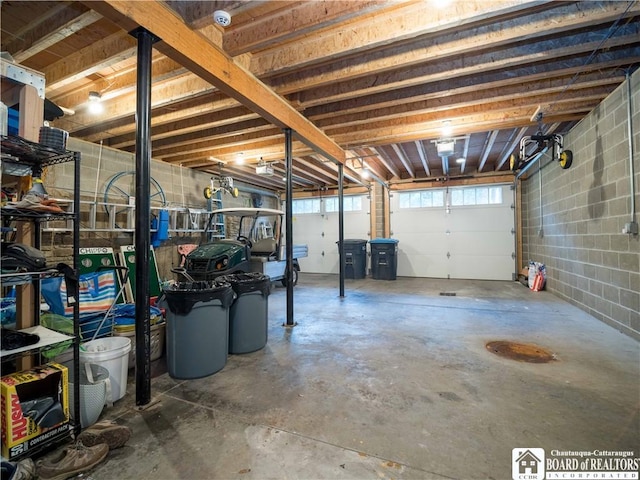 garage with concrete block wall