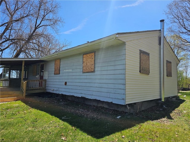 exterior space with a yard and a porch