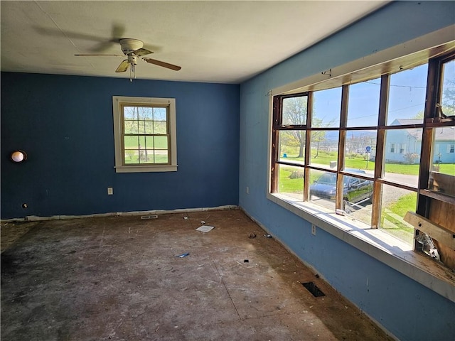empty room with a ceiling fan
