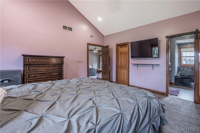 2575 Fuller Rd, Newfane, NY 14028 - carpeted bedroom with recessed lighting, high vaulted ceiling, visible vents, and a barn door
