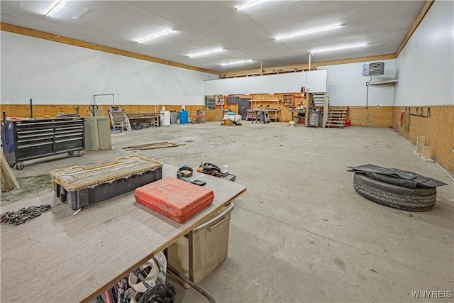 2575 Fuller Rd, Newfane, NY 14028 - miscellaneous room featuring a workshop area and unfinished concrete flooring