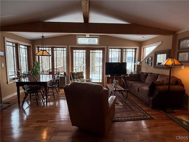 2321 Olanco Rd, Spafford, NY 13110 - living area with dark wood-style flooring and baseboards