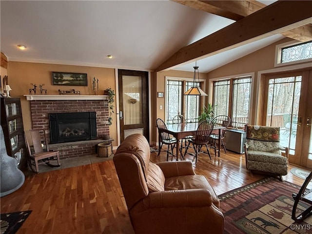 2321 Olanco Rd, Spafford, NY 13110 - living room featuring wood-type flooring and a fireplace