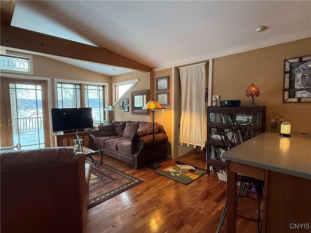 2321 Olanco Rd, Spafford, NY 13110 - living area featuring wood-type flooring and lofted ceiling