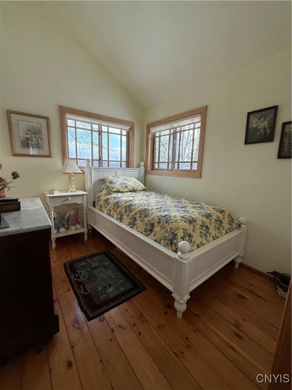 2321 Olanco Rd, Spafford, NY 13110 - bedroom featuring hardwood / wood-style flooring and lofted ceiling