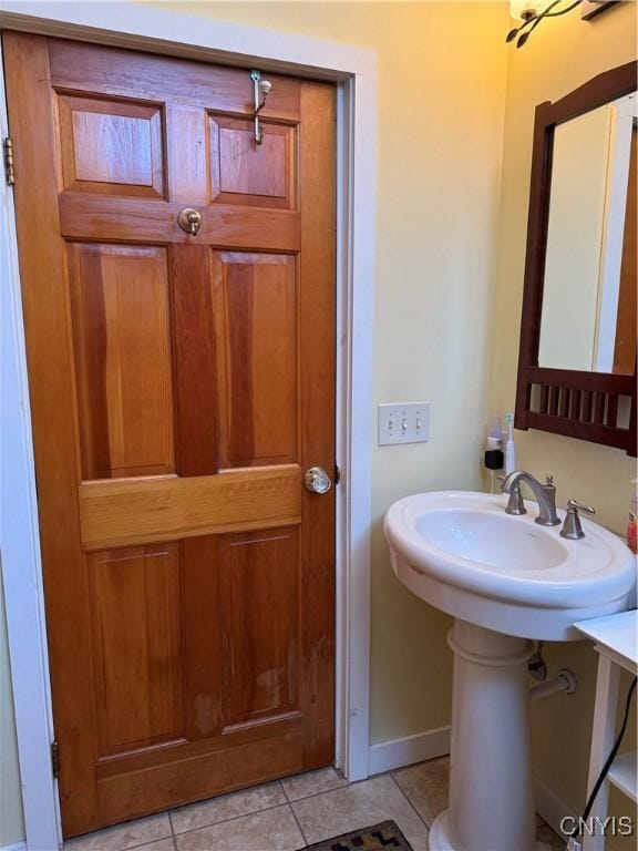 2321 Olanco Rd, Spafford, NY 13110 - bathroom featuring tile patterned flooring and baseboards