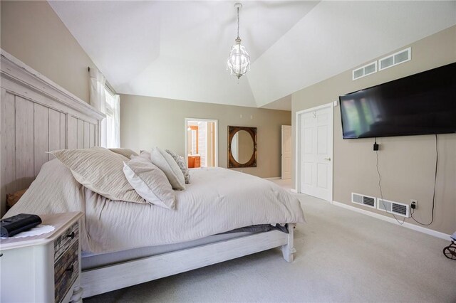 carpeted bedroom with baseboards, visible vents, and vaulted ceiling