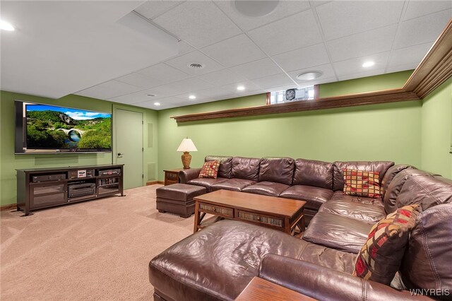 carpeted living area featuring recessed lighting, a drop ceiling, and visible vents