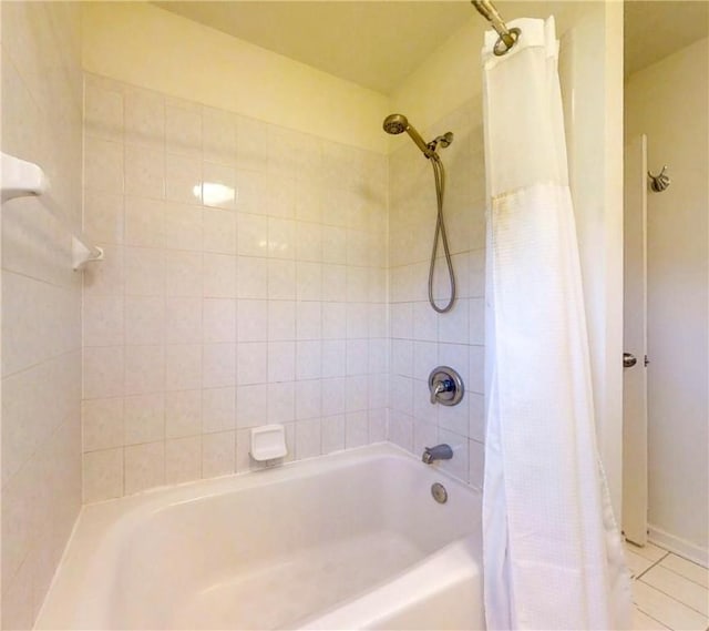 full bath with tile patterned floors and shower / bath combination with curtain