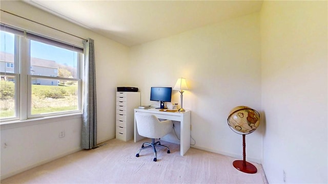 view of carpeted office space