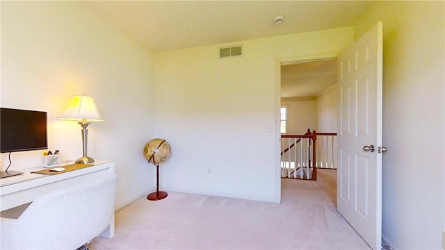 office area featuring carpet flooring and visible vents
