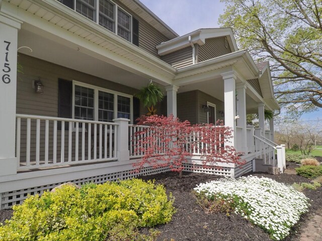 exterior space featuring covered porch