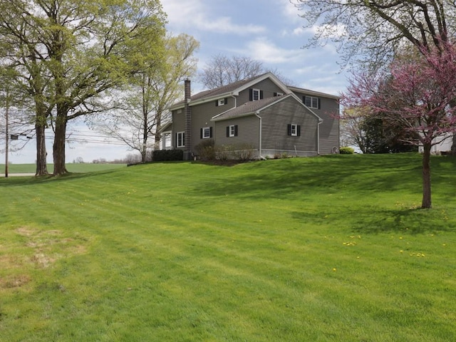 view of yard featuring central AC unit