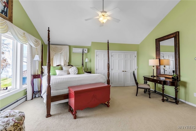 5561 Lockwood Hts, Newfane, NY 14126 - bedroom with vaulted ceiling, an AC wall unit, carpet, multiple closets, and a baseboard heating unit