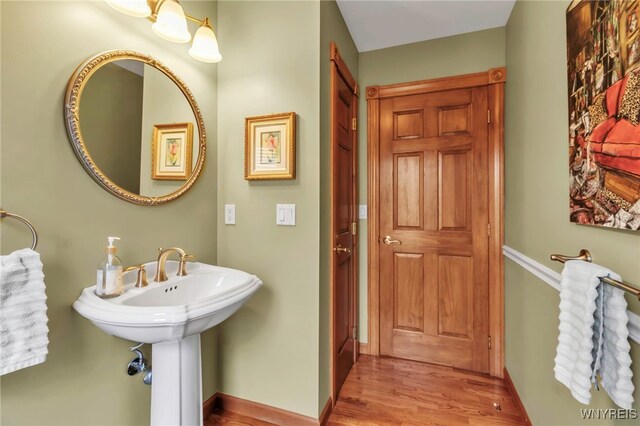 bathroom featuring wood finished floors