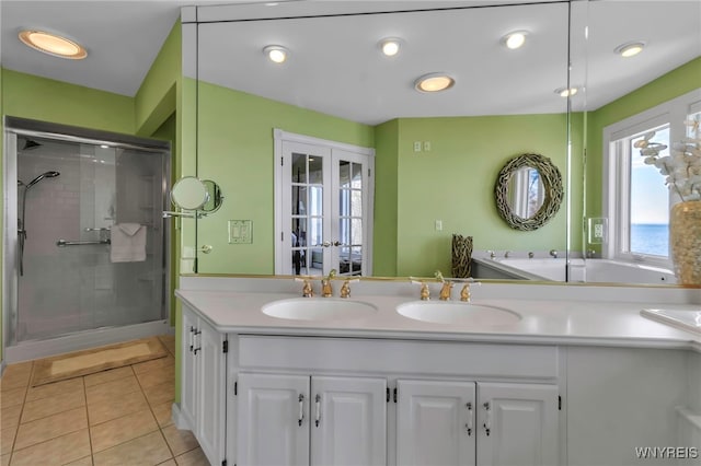 5561 Lockwood Hts, Newfane, NY 14126 - bathroom with a stall shower, tile patterned flooring, double vanity, and french doors