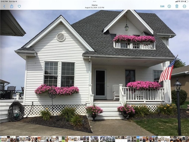 5561 Lockwood Hts, Newfane, NY 14126 - view of front facade featuring covered porch and roof with shingles