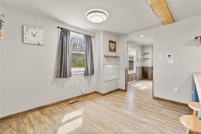 interior space with recessed lighting, baseboards, visible vents, and light wood-style flooring