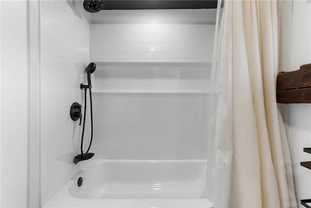 bathroom featuring shower / tub combo with curtain
