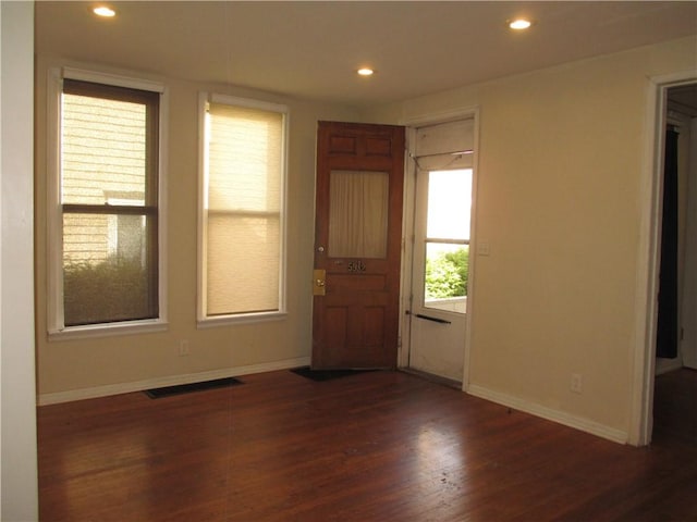 57-59 Maple St, Oneonta-City, NY 13820 - unfurnished room featuring baseboards, recessed lighting, dark wood finished floors, and visible vents