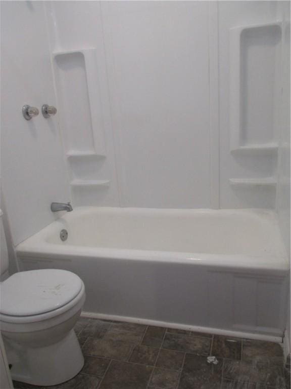 57-59 Maple St, Oneonta-City, NY 13820 - bathroom featuring stone finish floor and toilet