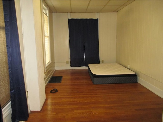 57-59 Maple St, Oneonta-City, NY 13820 - bedroom featuring visible vents, a paneled ceiling, and wood finished floors