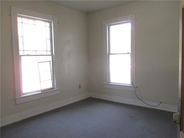 57-59 Maple St, Oneonta-City, NY 13820 - carpeted empty room with baseboards