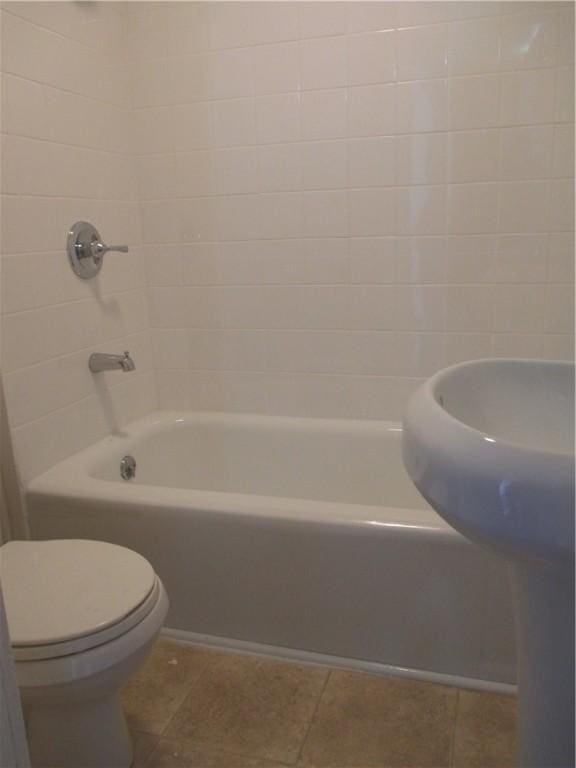 57-59 Maple St, Oneonta-City, NY 13820 - full bath with toilet, tile patterned floors, and shower / washtub combination
