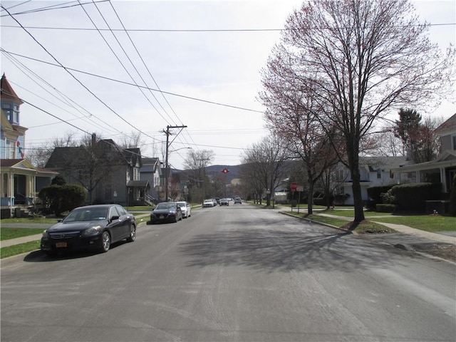 57-59 Maple St, Oneonta-City, NY 13820 - view of road with curbs, traffic signs, sidewalks, and a residential view
