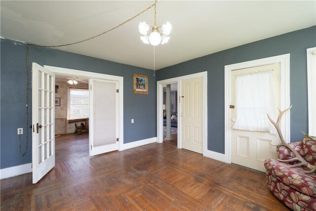 9 Porter St, Prattsburgh, NY 14873 - interior space with baseboards, french doors, and a chandelier