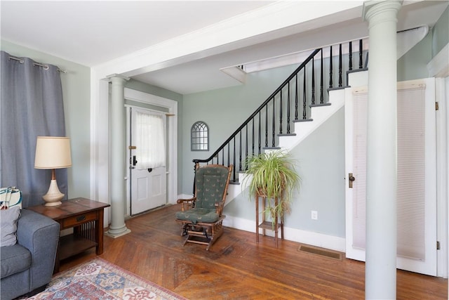 9 Porter St, Prattsburgh, NY 14873 - foyer entrance featuring stairway, ornate columns, and wood finished floors