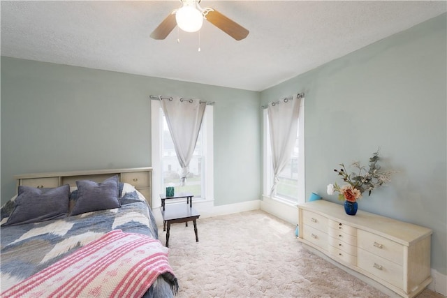 9 Porter St, Prattsburgh, NY 14873 - bedroom with baseboards, a ceiling fan, and light colored carpet