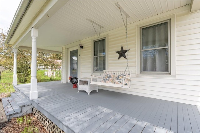 9 Porter St, Prattsburgh, NY 14873 - wooden deck featuring a porch