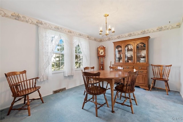4765 Rosemary Ln, Clay, NY 13088 - dining area featuring an inviting chandelier, light colored carpet, and visible vents