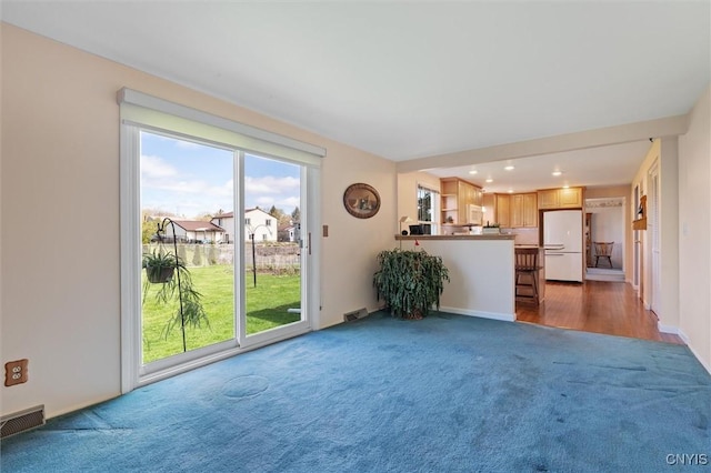 4765 Rosemary Ln, Clay, NY 13088 - unfurnished living room with carpet flooring, recessed lighting, and visible vents