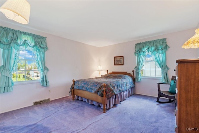 4765 Rosemary Ln, Clay, NY 13088 - bedroom with carpet floors, baseboards, and visible vents
