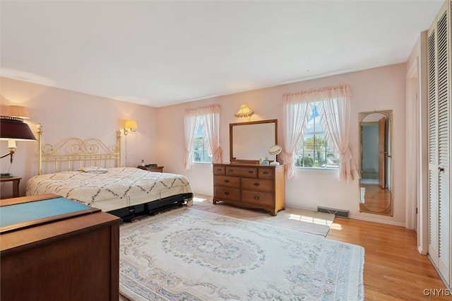4765 Rosemary Ln, Clay, NY 13088 - bedroom featuring visible vents, light wood-style flooring, and baseboards