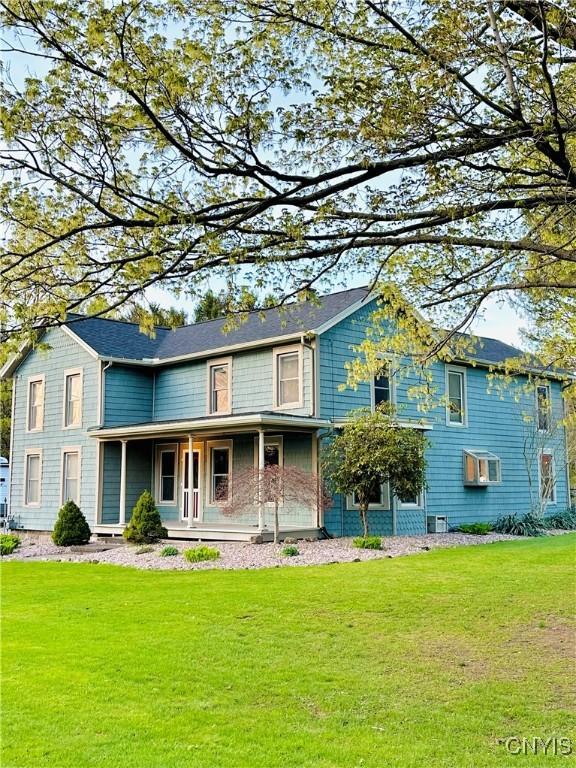 1058 State Route 48, Granby, NY 13069 - view of front of property with a front lawn and covered porch