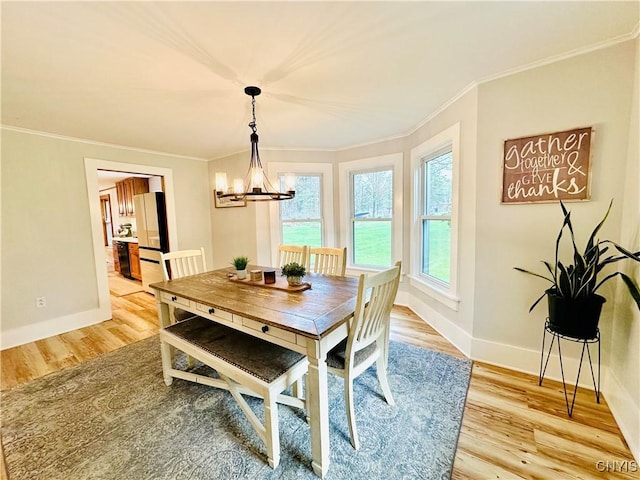 1058 State Route 48, Granby, NY 13069 - dining room with light wood-style floors, baseboards, and ornamental molding