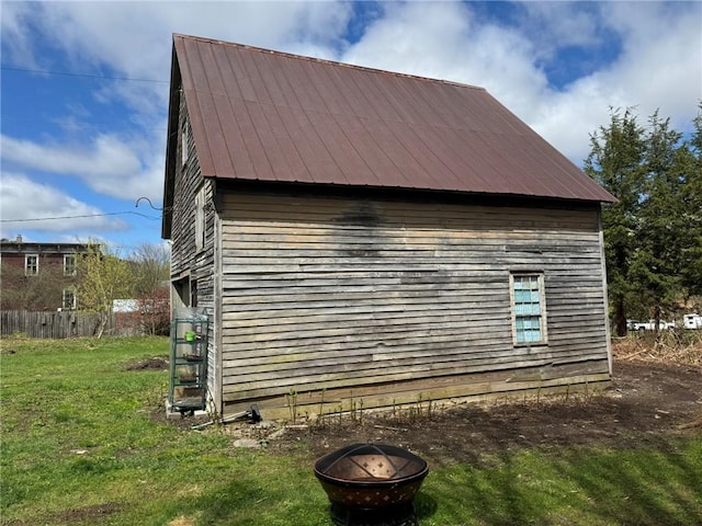 2129 State Highway 206, Masonville, NY 13849 - view of side of property with a lawn, fence, and a fire pit