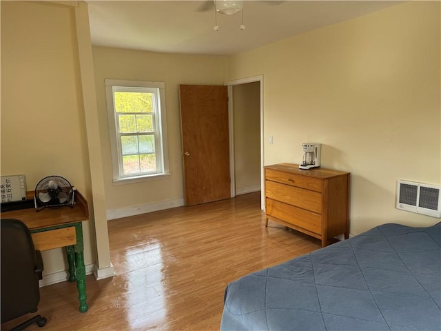 2129 State Highway 206, Masonville, NY 13849 - bedroom with ceiling fan, baseboards, visible vents, and wood finished floors