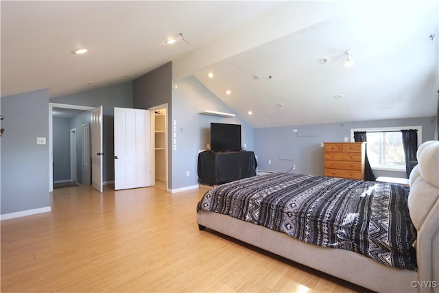 bedroom featuring light wood-style floors, baseboards, recessed lighting, and lofted ceiling