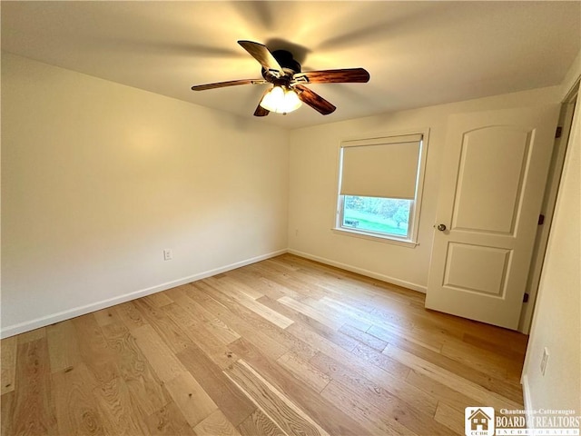unfurnished bedroom with baseboards, a ceiling fan, and light wood finished floors