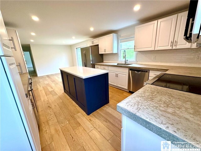 3542 Morgan Hollow Rd, Allegany, NY 14706 - kitchen featuring a sink, light wood-style floors, stainless steel appliances, recessed lighting, and white cabinetry