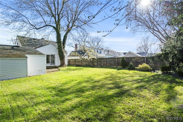 view of yard featuring a fenced backyard