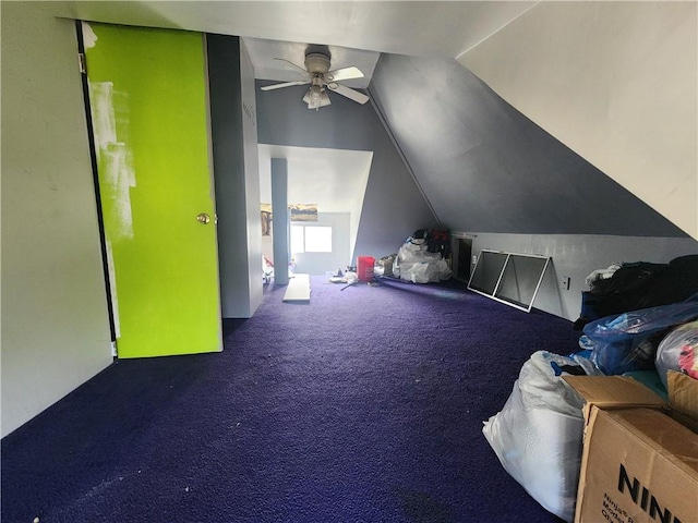 bedroom featuring carpet floors and lofted ceiling