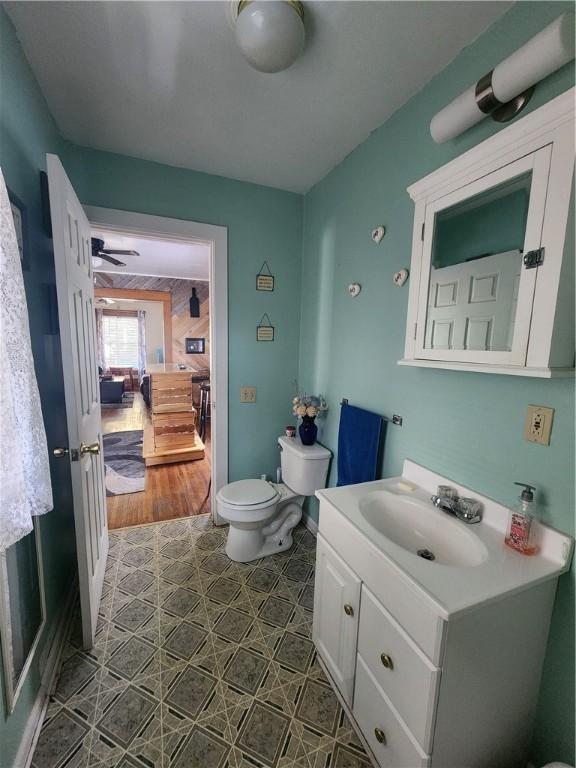 bathroom with vanity and toilet