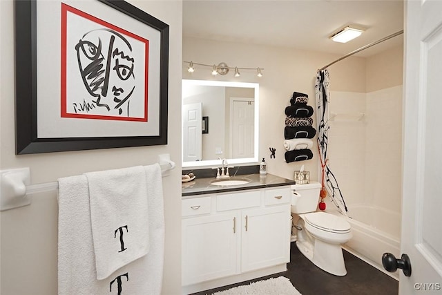 full bathroom with vanity, toilet, and shower / bath combination with curtain