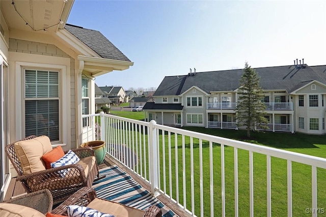 balcony featuring a residential view