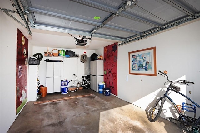 garage featuring a garage door opener